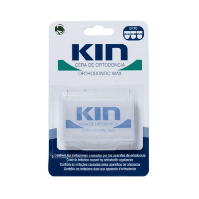 Embalagem de cera de ortodontia KIN branca e azul com texto em várias línguas
