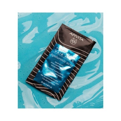 Pacote de máscara de cabelo Apivita em fundo azul