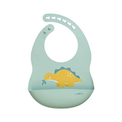 Babete de silicone verde água com bolso e ilustração de dinossauro amarelo