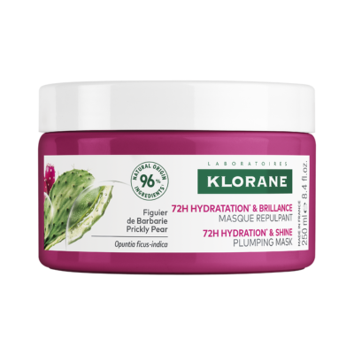 Frasco de máscara hidratante e brilhante Klorane rosa com tampa branca e etiqueta com cacto