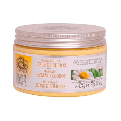 Pote de máscara capilar amarelo para reflexos louros com tampa prateada e etiqueta com flor