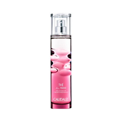 Frasco spray de perfume Caudalie rosa e transparente