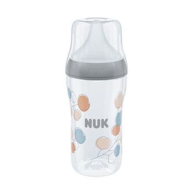 Mamadeira transparente com tampa cinza e padrões florais coloridos