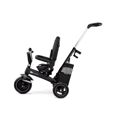 Triciclo infantil preto com barra de empurrar e saco de armazenamento.