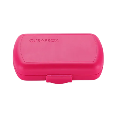 Estojo rígido cor-de-rosa com CURAPROX na tampa