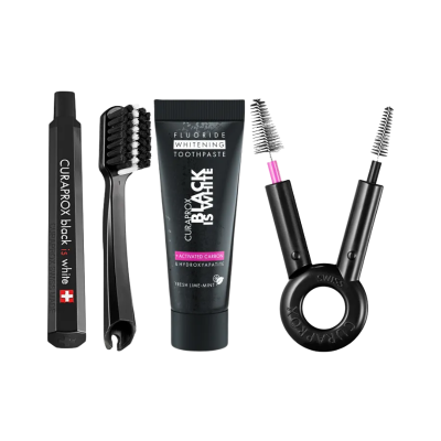 Conjunto CURAPROX Black is White com pasta dentífrica, escova, aplicador e instrumento com duas escovas pequenas