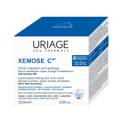 Caixa branca e azul do creme Uriage Xemose C8+, texto em francês e inglês
