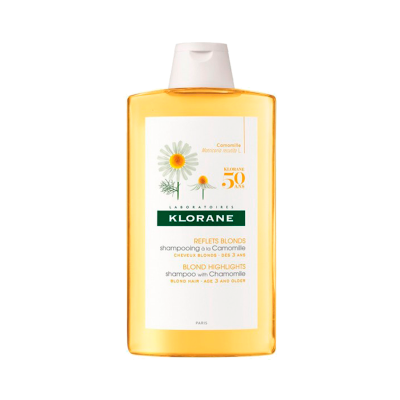 Frasco de champô Klorane para reflexos loiros com camomila, cor âmbar e tampa branca