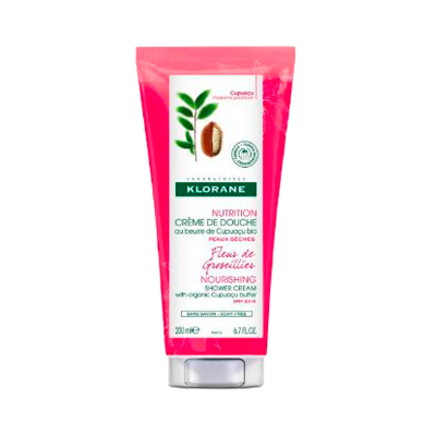 Tubo rosa de creme de duche Klorane com rótulo branco e verde