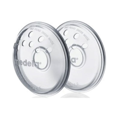 Discos transparentes de plástico com buracos e texto Medela em fundo branco