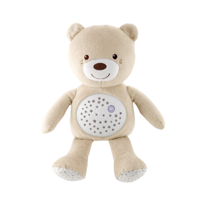 Ursinho de peluche bege com barriga iluminada e padrão de estrelas