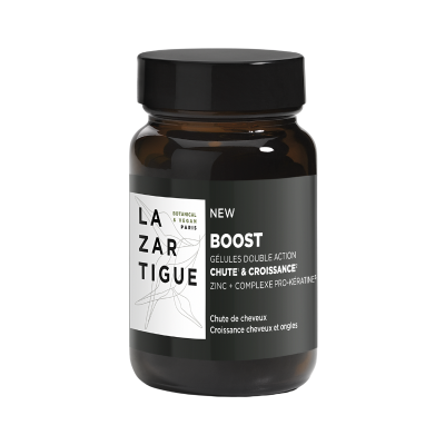 Frasco de comprimidos marron escuro com rótulo em preto e branco.