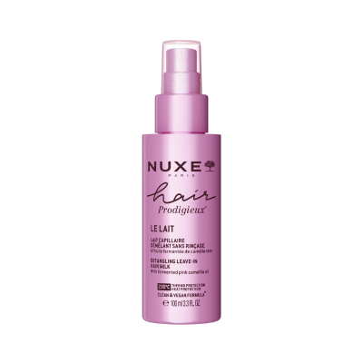 Frasco rosa com pulverizador do produto NUXE hair Prodigieux LE LAIT para cabelo