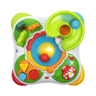 Brinquedo infantil colorido em plástico com formas geométricas e elementos decorativos.