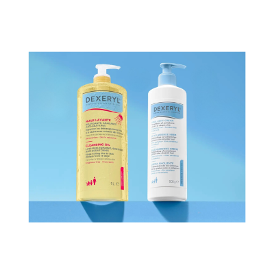 Frascos de óleo de limpeza e creme emoliente Dexeryl sobre fundo azul