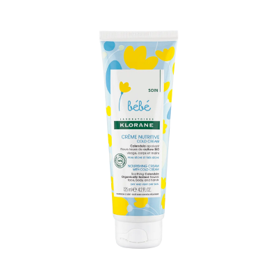 Tubo de creme nutritivo para bebés da KLORANE com decoração floral amarela e azul.