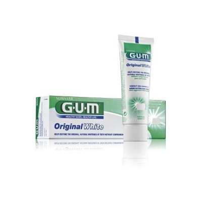 Pasta de dentes GUM Original White tubo e embalagem branca com detalhes verdes e azuis.