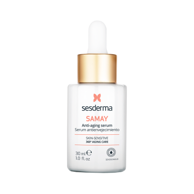 Frasco branco de sérum anti-envelhecimento com tampa dourada e conta-gotas