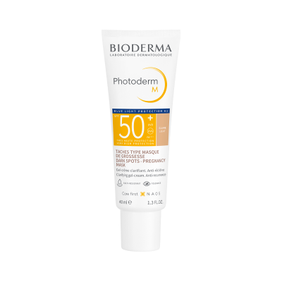 Frasco branco de creme Photoderm M Bioderma SPF 50+