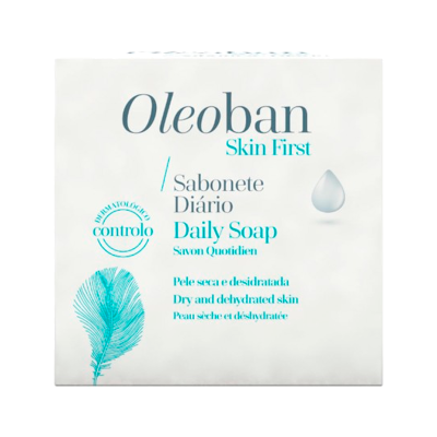 Embalagem branca de sabonete Oleoban Skin First com texto azul e cinza