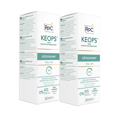 Dois frascos de desodorizante ROC KEOPS roll-on em embalagem branca com texto verde e azul
