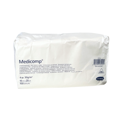 Embalagem branca de compressas Medicomp com informações e código de barras