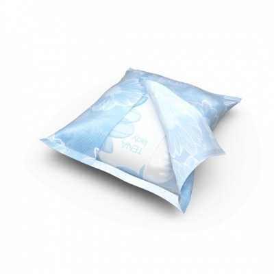 Embalagem azul claro floral contendo produto esférico branco com texto TEA BOX