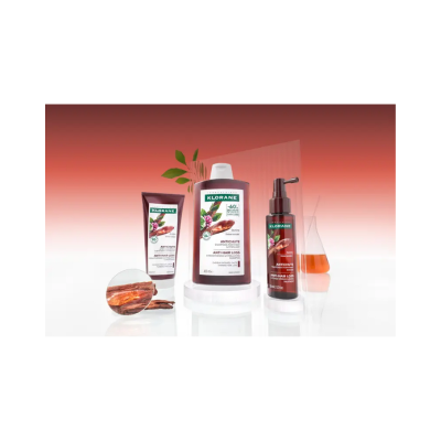 Produtos capilares KLORANE antiqueda com fundo vermelho e branco