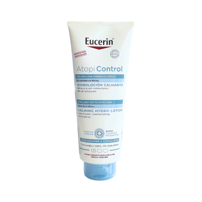 Tubo branco e azul de creme Eucerin Atopi Control para pele seca e atópica