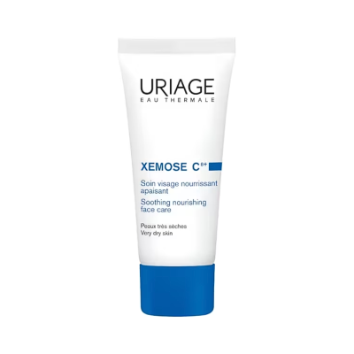 Frasco branco de creme com tampa azul URIAGE XEMOSE C8+, cuidado facial nutritivo
