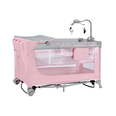 berço portátil cor-de-rosa com mó e trocador