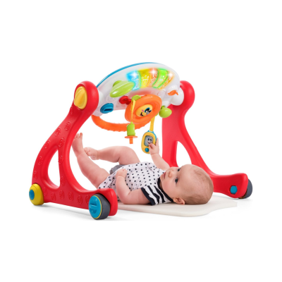 Ginásio de bebé com brinquedos coloridos e luzes em estrutura vermelha e base branca acolchoada.