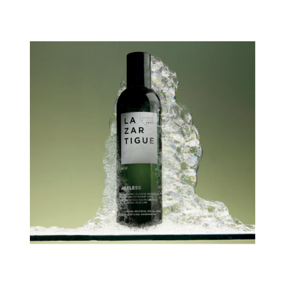Frasco verde LAZARTIGUE com espuma translúcida e fundo verde