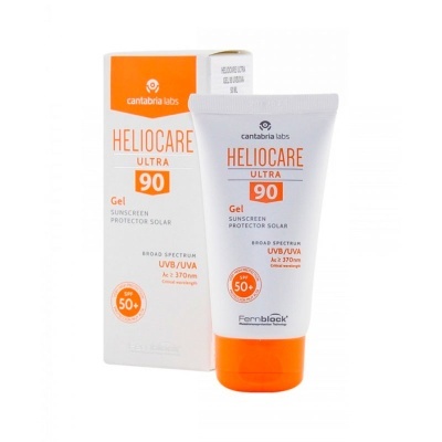 Protetor solar em gel HELIOCARE ULTRA 90 com embalagem branca e laranja