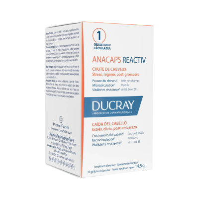 Embalagem branca Ducray Anacaps Reactiv para queda de cabelo com texto em francês e espanhol
