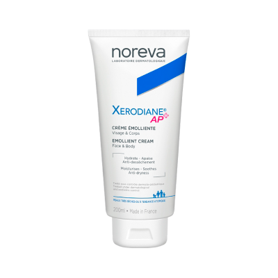 Creme emoliente Noreva Xerodiane AP+ em tubo branco para rosto e corpo