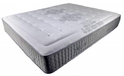 Colchão branco com padrão floral cinzento e laterais acolchoadas cinza claro