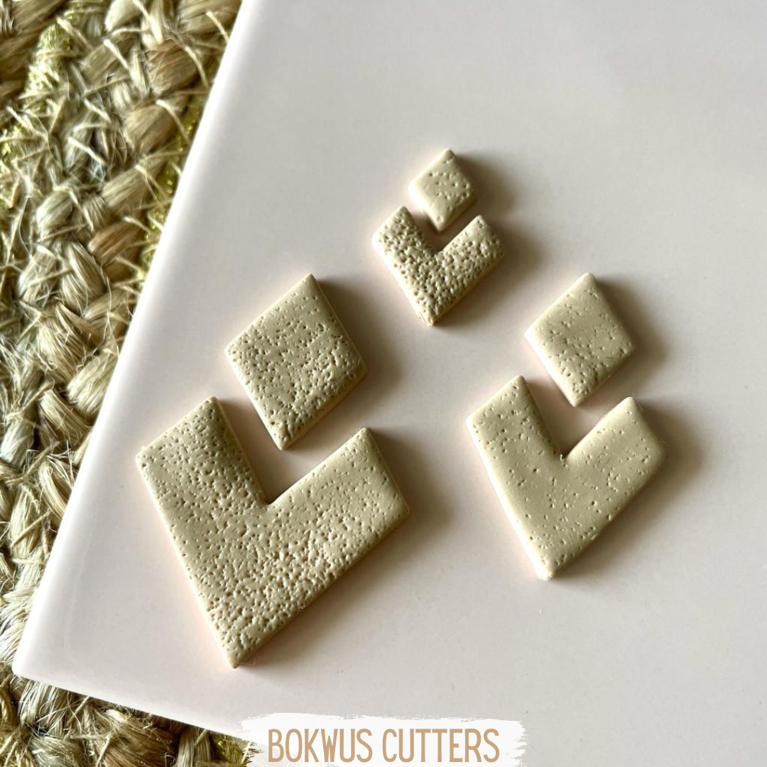 Conjunto de 6 cortadores - BC038 Conjunto de cortantes para bolachas brancos com textura salpicada em três tamanhos sobre superfície branca