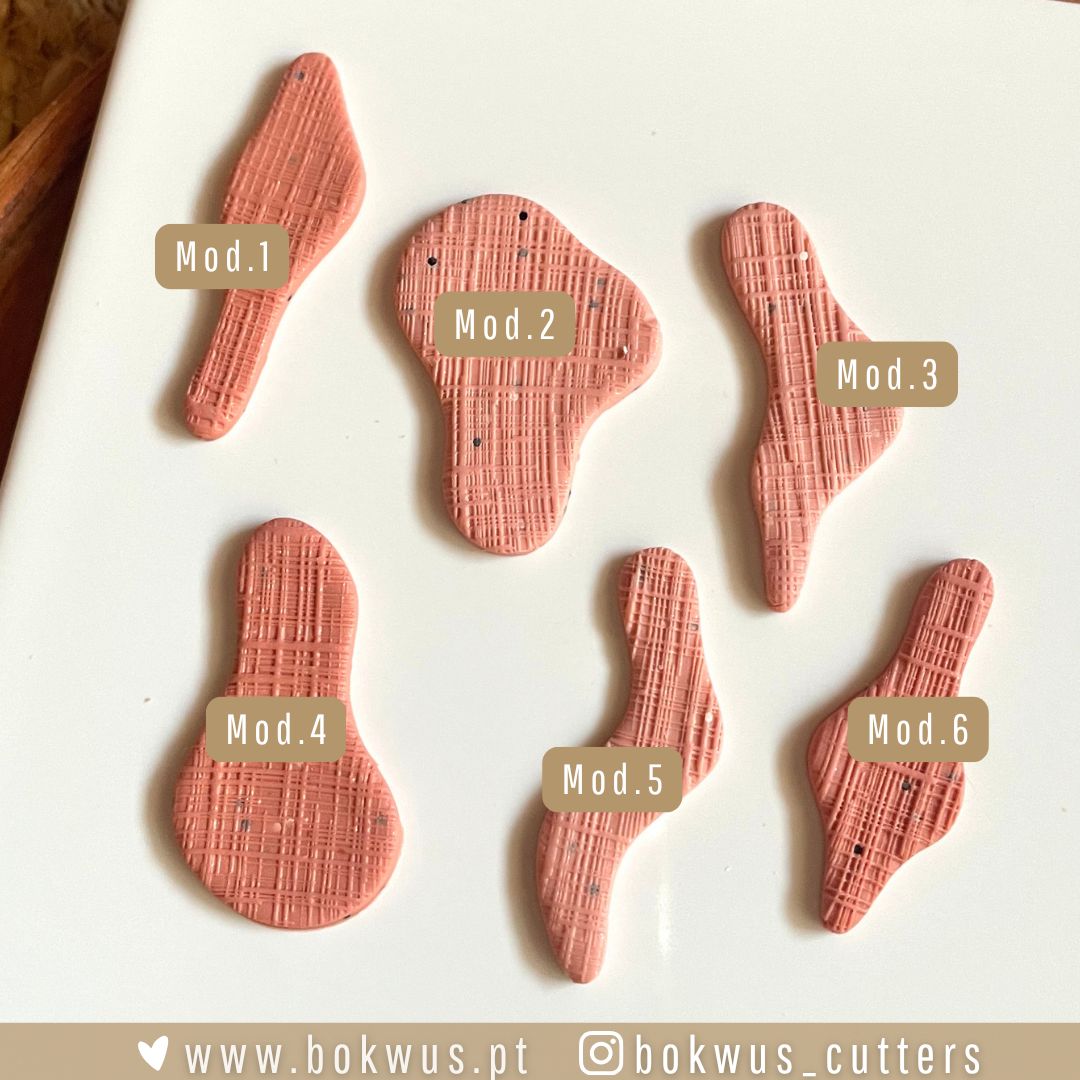 Cortadores formas orgânicas Seis cortadores rosa texturizados com rótulos Mod.1 a Mod.6 sobre fundo branco