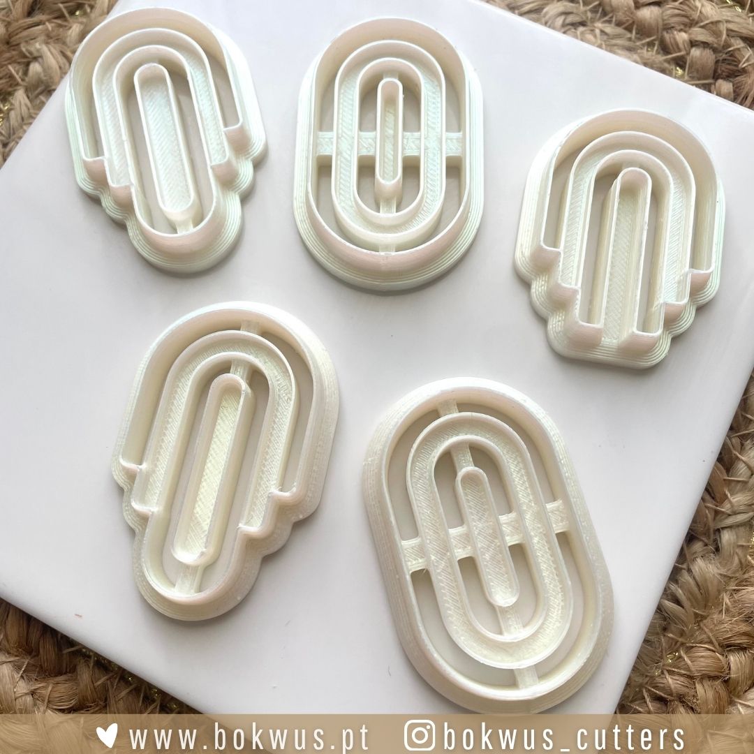 Pack Art Déco (5cm) - Conjunto de 5 cortadores Conjunto de cortantes geométricos brancos de cozinha numa placa branca