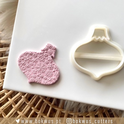 Cortador de biscoito e massa em forma de ornamento de Natal com textura de flocos de neve