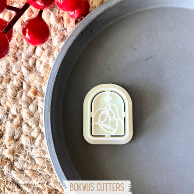 Cortador de biscoitos desenho de Maria e Jesus em base redonda cinza