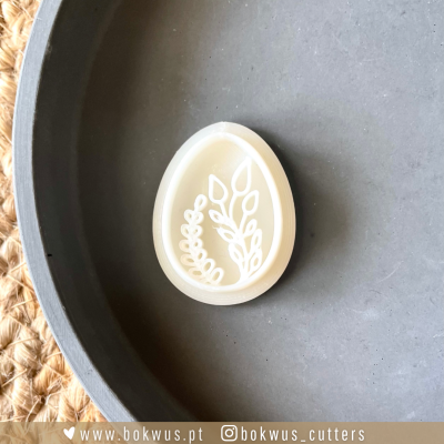 Carimbo de silicone oval branco com padrão de folhas em relevo