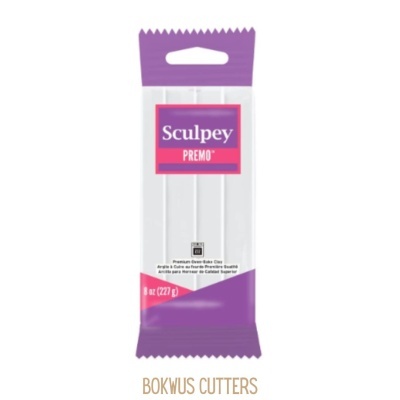 Massa de modelar Sculpey Premo branca em embalagem plástica roxa.