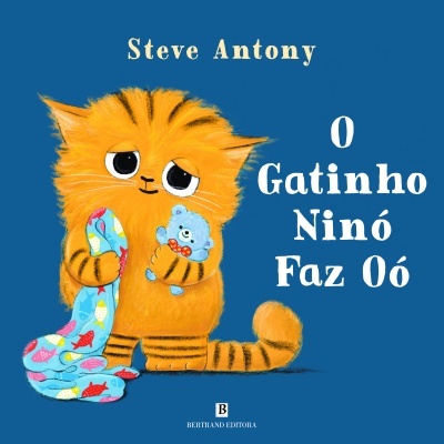 Capa de livro infantil com gatinho laranja e cobertor azul com peixes