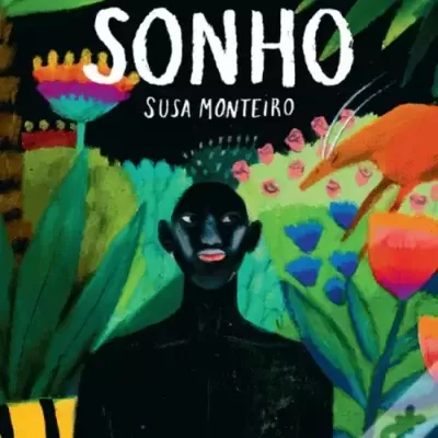 Capa de livro colorida com figura negra e plantas tropicais e texto SONHO SUSÁ MONTEIRO