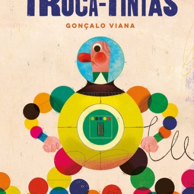 Capa de livro TROCA-TINTAS com figura geométrica colorida feita de círculos