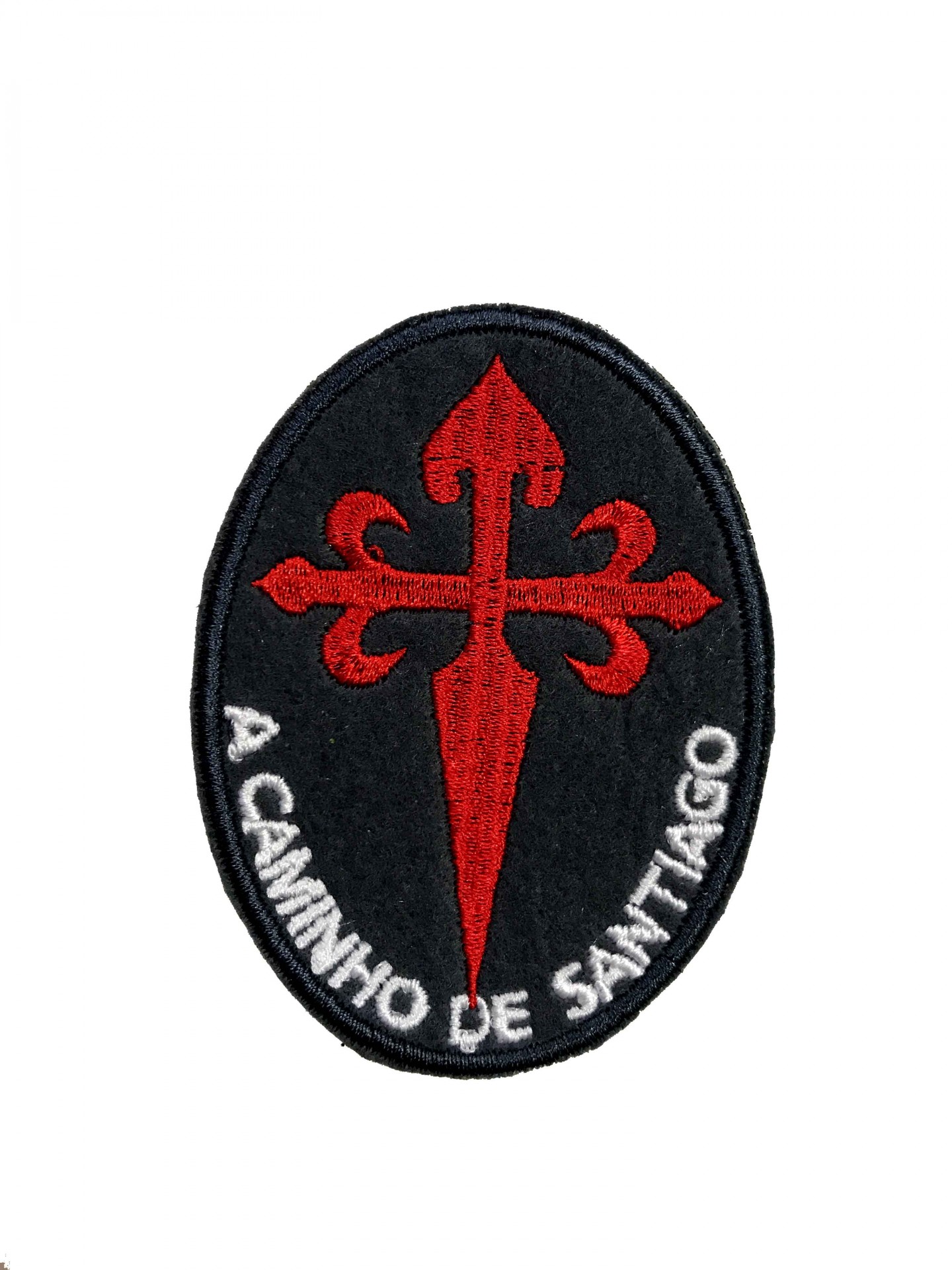 Patch oval preto com cruz vermelha e texto branco A CAMINHO DE SANTIAGO