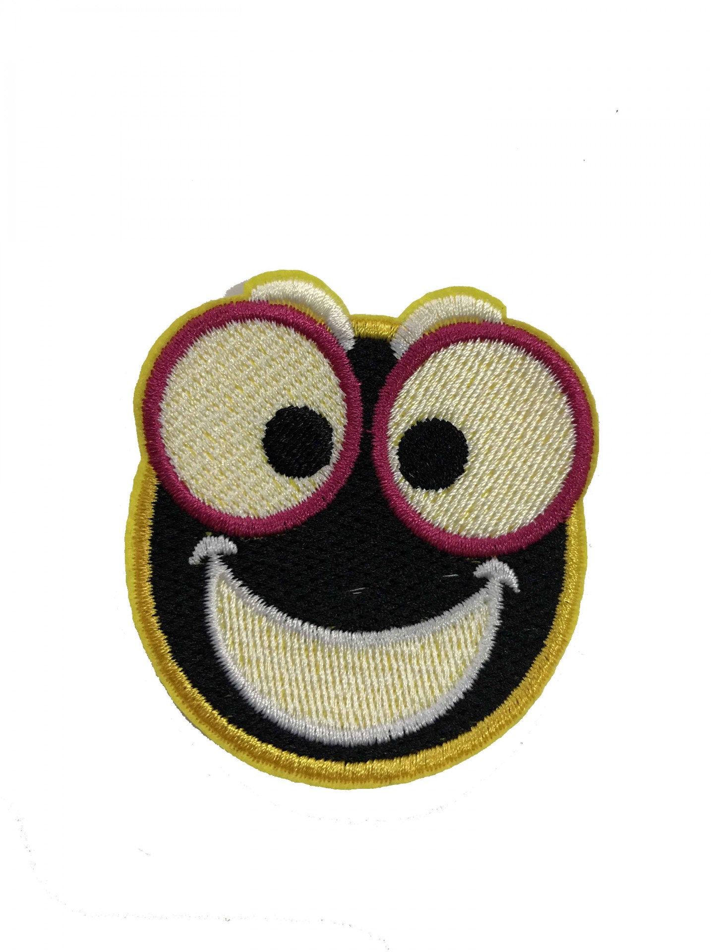 Emblema bordado rosto sorridente com olhos grandes e sorriso amarelo