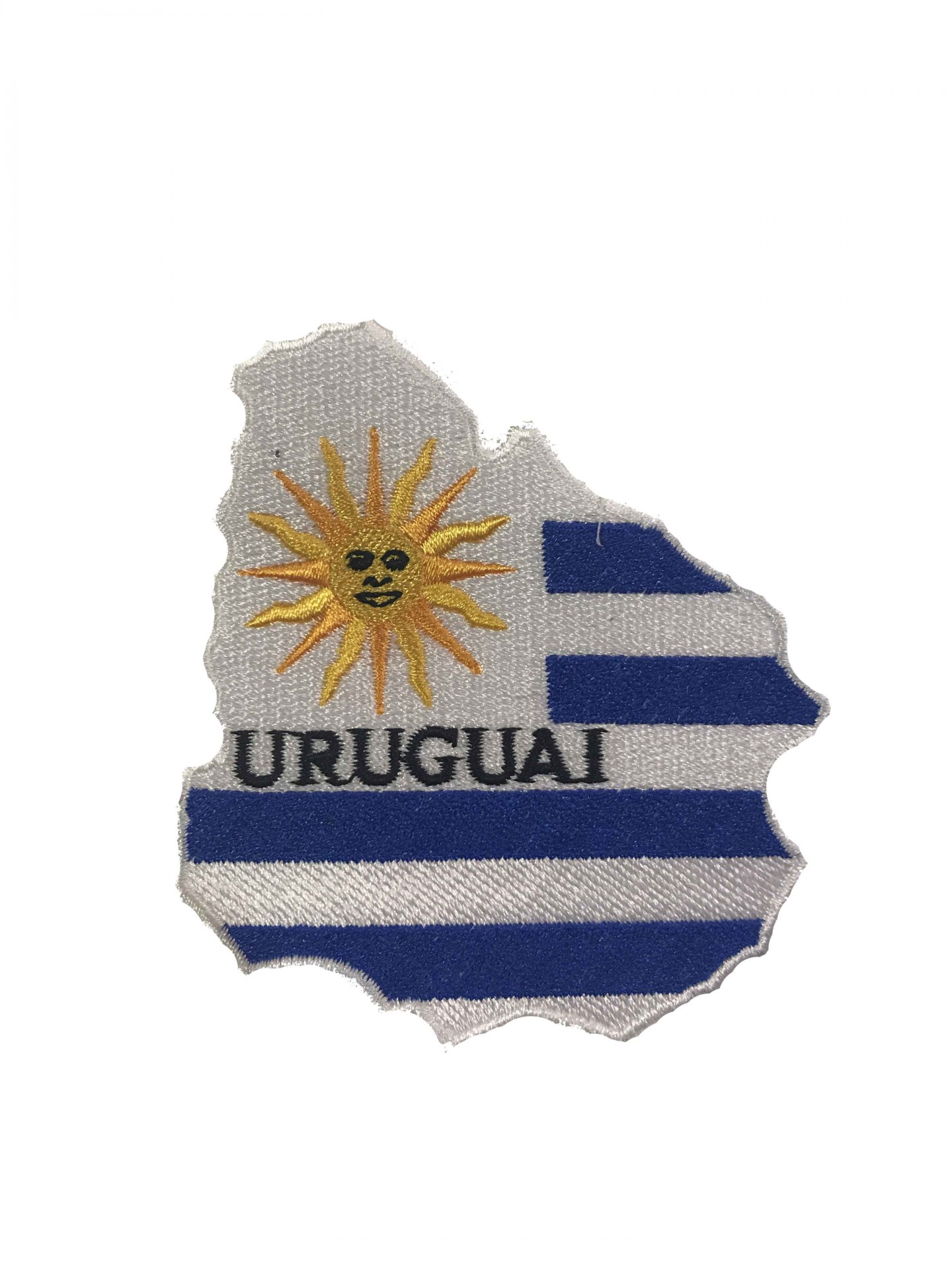 Patch bordado em forma do mapa do Uruguai com as cores da bandeira e a palavra 'URUGUAI'.